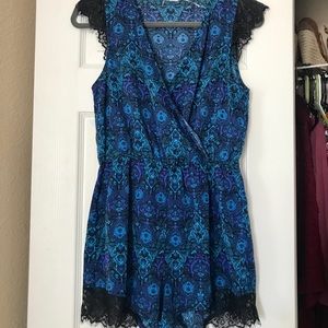 Romper with lace-inset. Never worn! Size M.